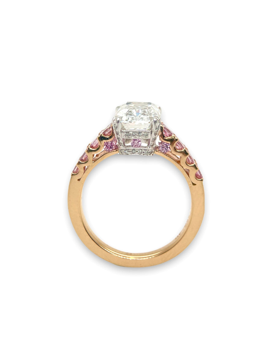 Emerald cut diamond ring with pink diamonds
