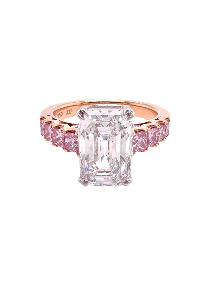 Emerald cut diamond ring with pink diamonds