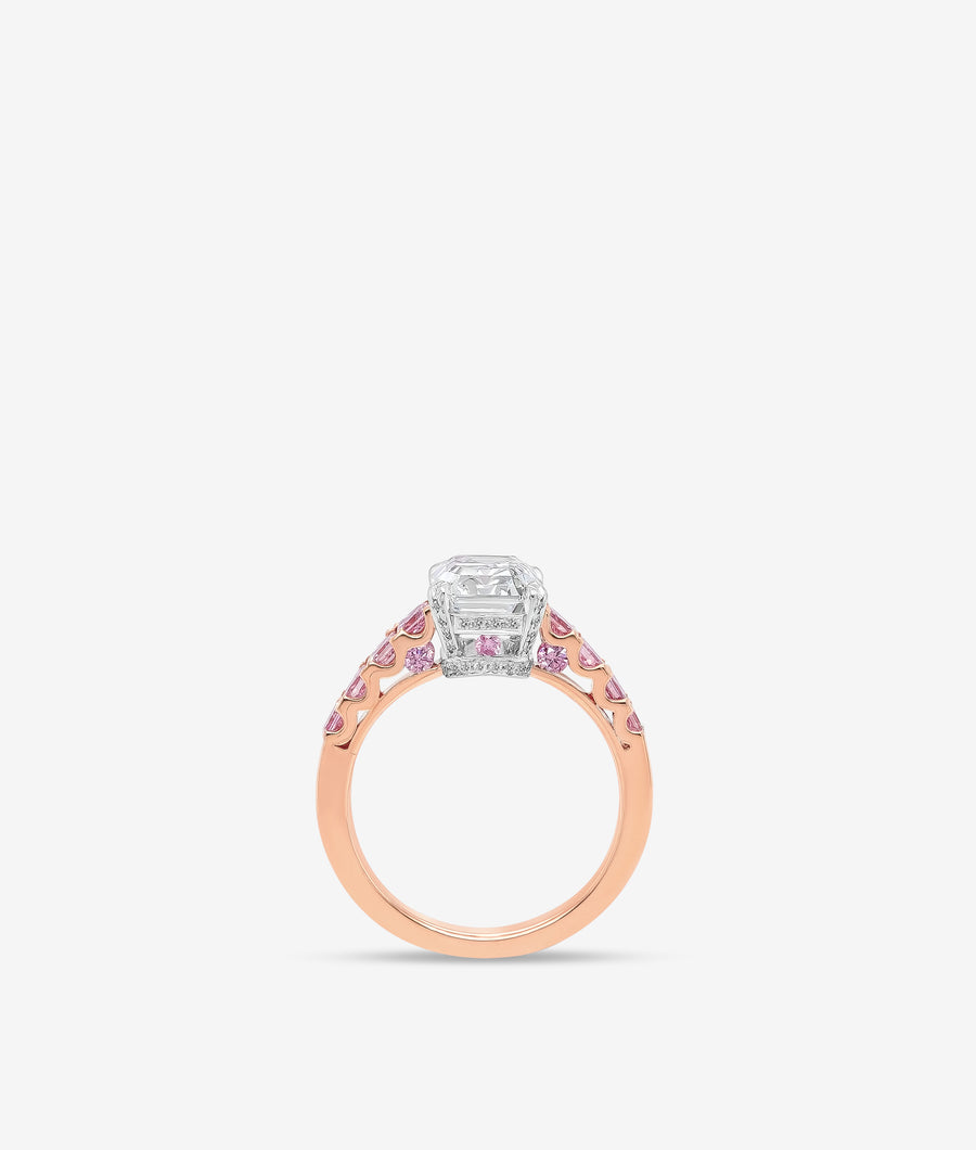 Emerald cut diamond ring with pink diamonds