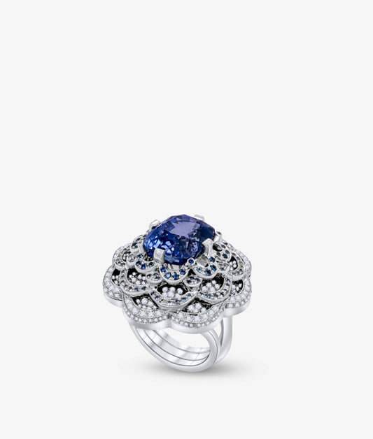 Cushion cut Sapphire set on a Flower Bed of Sapphires and Diamonds