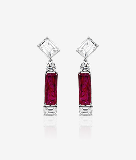Rectangular ruby earrings with emerald cut diamond tops