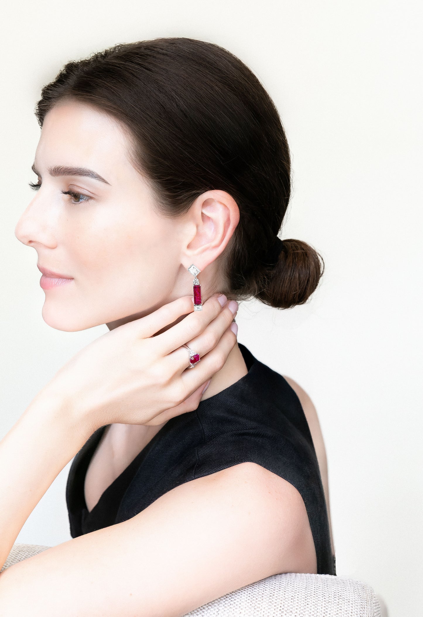 Rectangular ruby earrings with emerald cut diamond tops